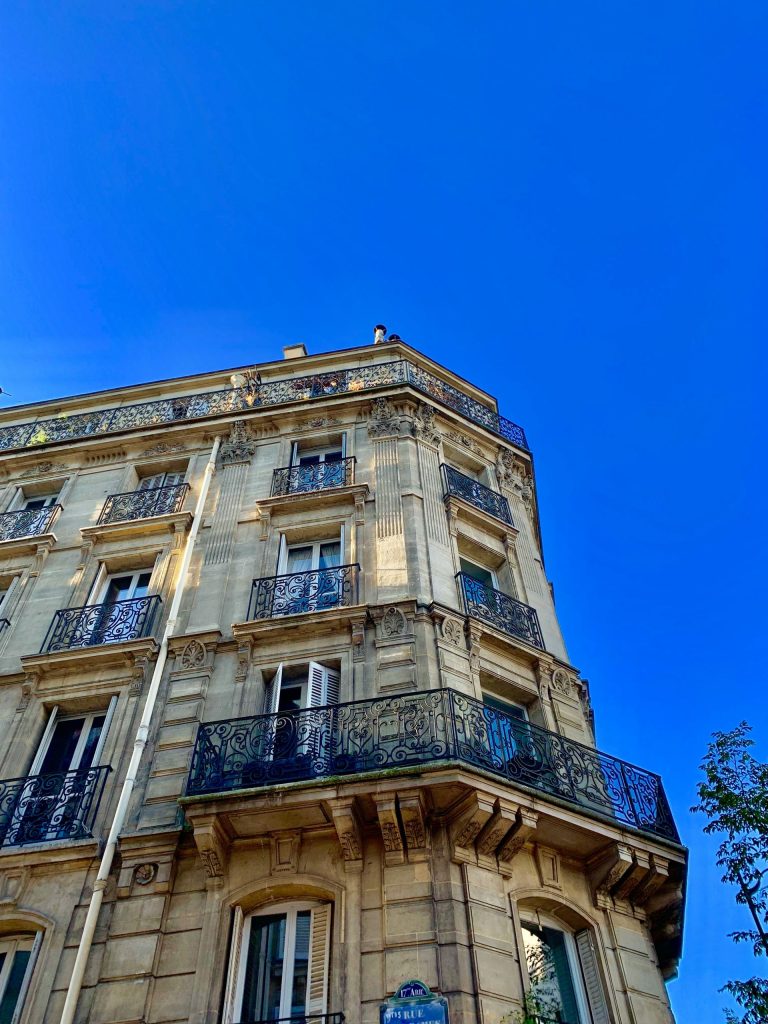 beige concrete high-rise building